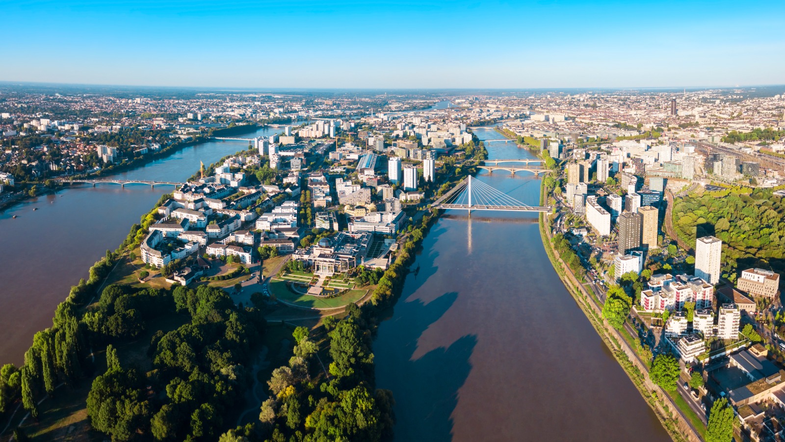 Nantes city between the branches of the Loire river aerial view in Loire-Atlantique region in France