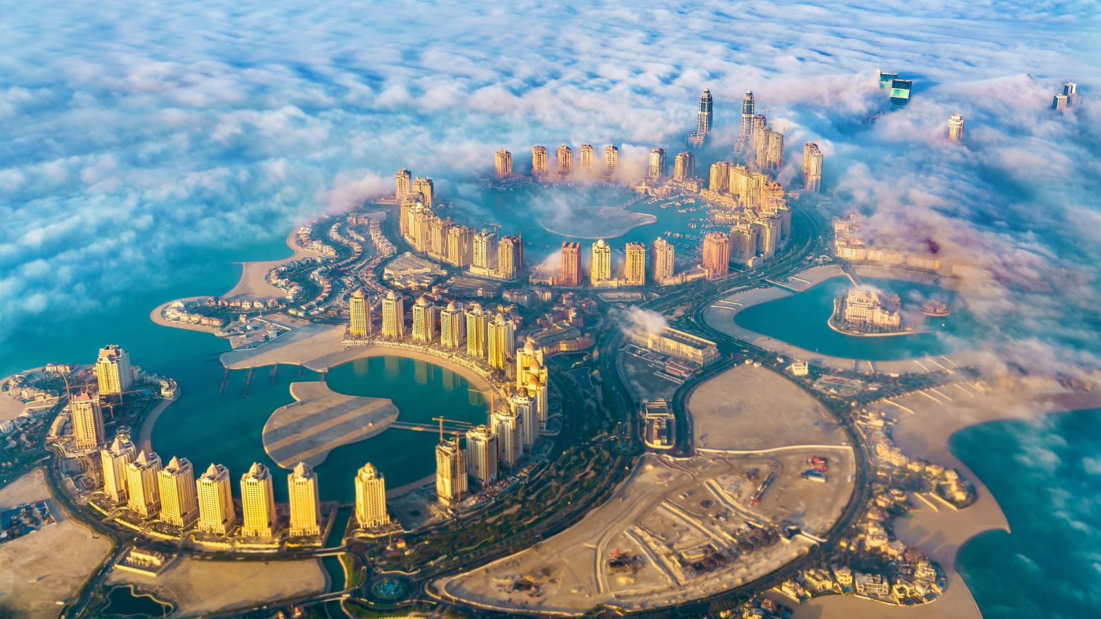 Aerial view of the Pearl-Qatar island in Doha through the morning fog. Qatar, the Persian Gulf