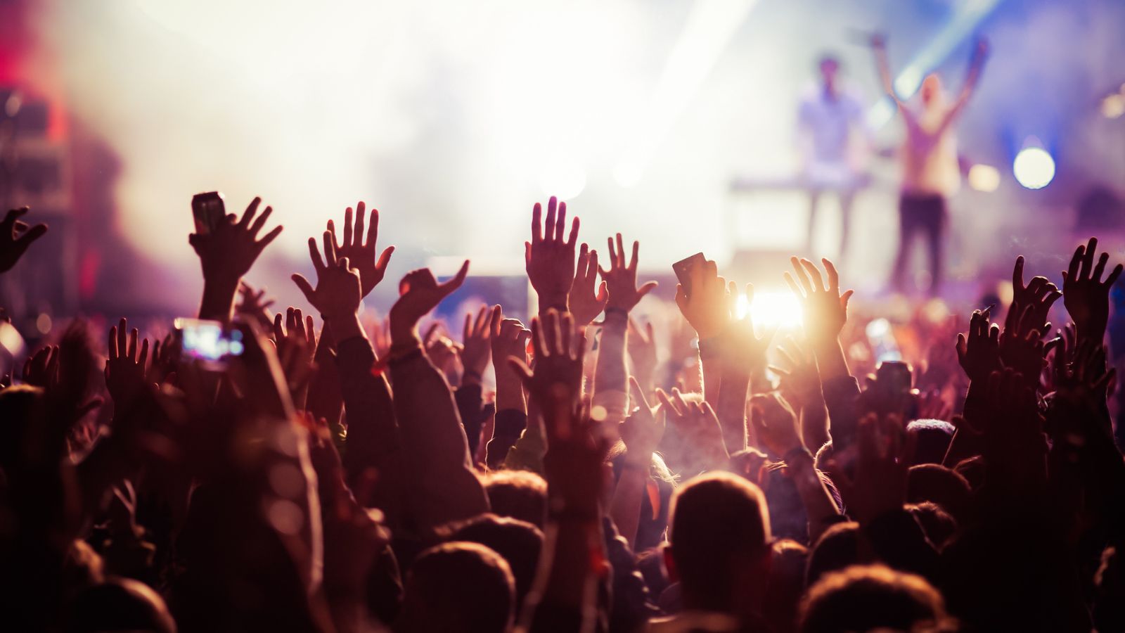 EDM concert party people blurry night club