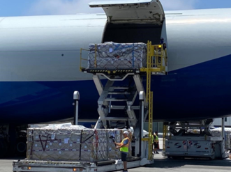 Operation Fly Formula - Air Partner loading cargo baby formula into aircraft