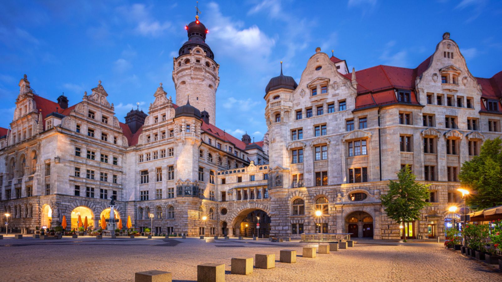 Cityscape image of Leipzig, Germany with New Town Hall at twilight blue hour.