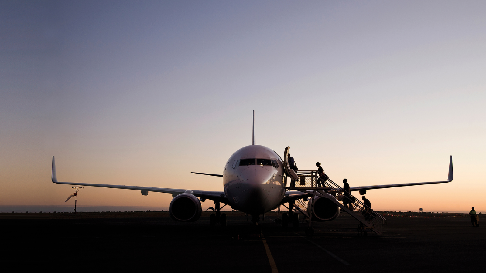 MICE group boarding an aircraft